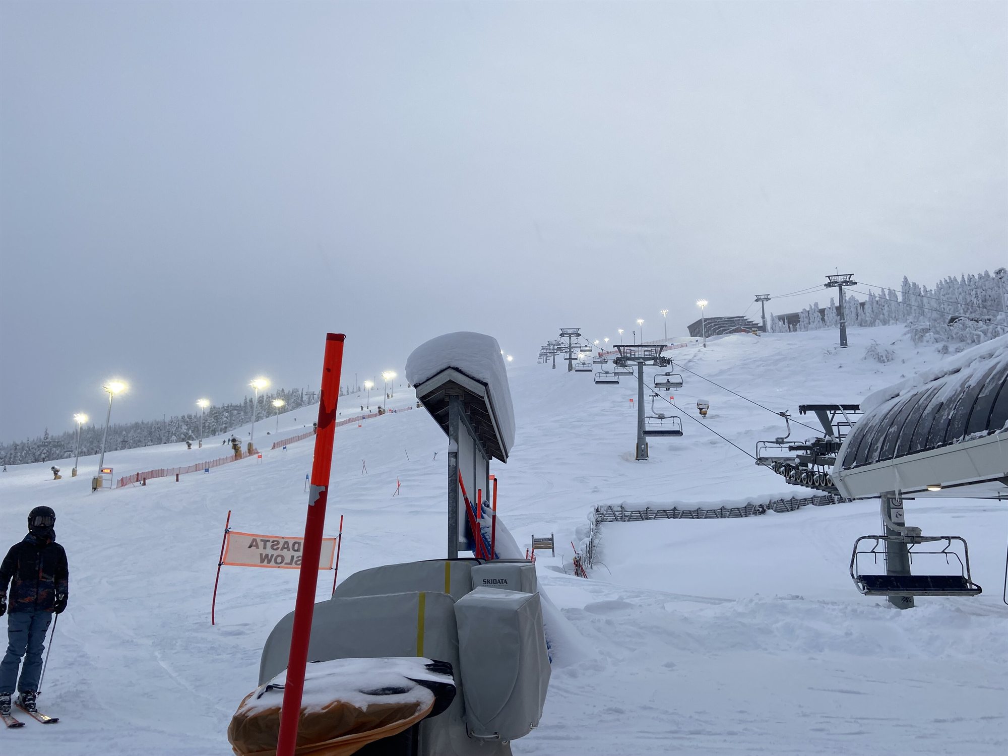 Snow-covered North ski slope and chairlift at Levi.