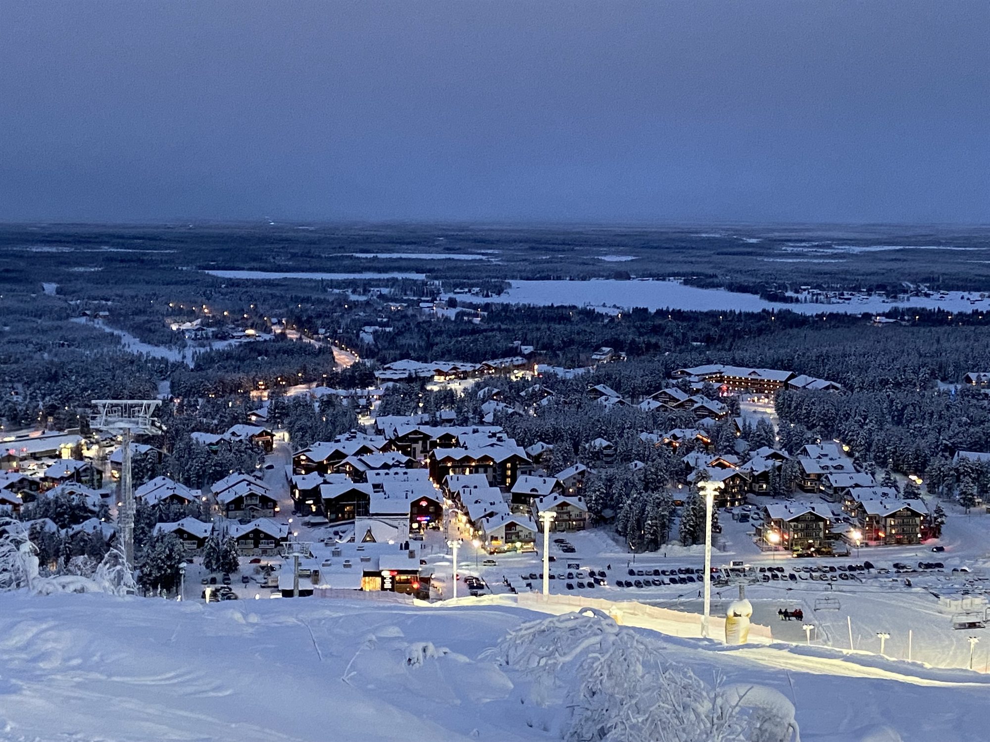 Winter view over illuminated Sirkka village from Levi fell.